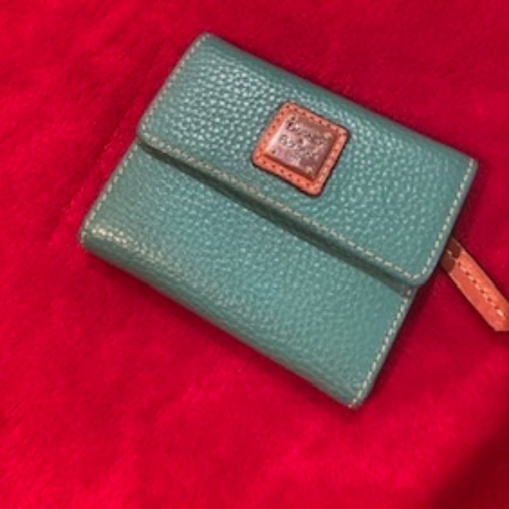 Dooney & Bourke  turquoise trifold wallet